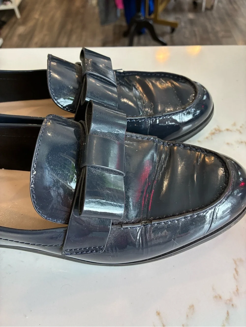 Stuart Weitzman Patent Leather Bow Loafers in Deep Navy